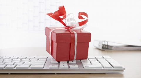 computer keyboard and present on table