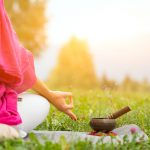 Yoga position with Tibetan bell