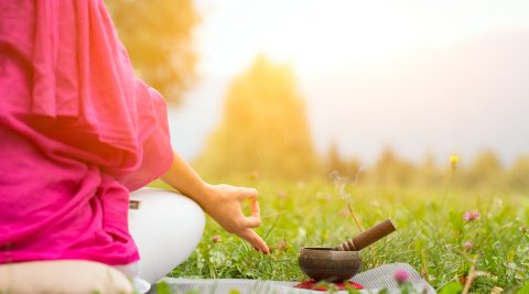 Yoga position with Tibetan bell