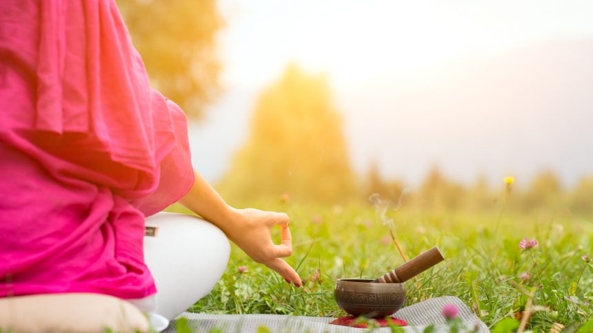 Yoga position with Tibetan bell